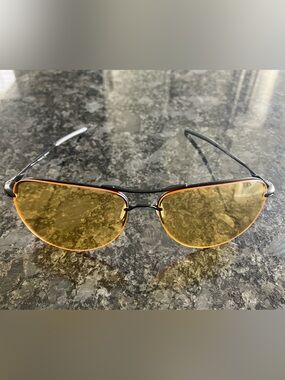Oakley Black Frame Sunglasses with Yellow Lenses